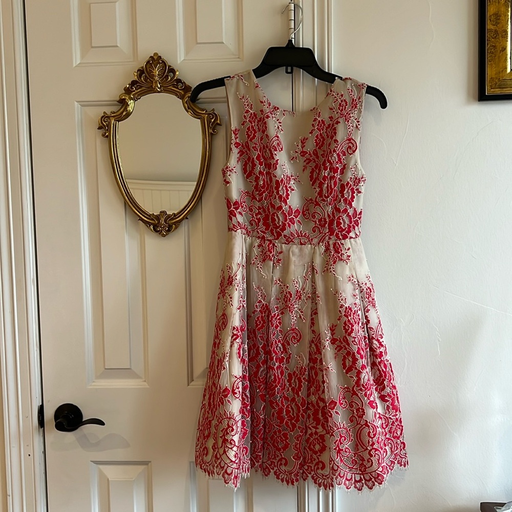 Alice And Olivia, a tan and red lace cocktail dress